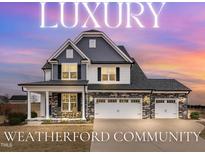 Stunning two-story home with three-car garage, stone accents, and inviting front porch at 59 N Clearbrook Ct, Angier, NC 27501