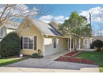 Charming one-story home with a well-maintained lawn, established trees, and neutral siding at 509 High Ridge Dr, Durham, NC 27707