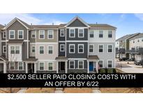 Charming townhome exteriors featuring varied siding colors and well-maintained landscaping at 6351 Perry Creek Rd, Raleigh, NC 27616