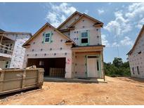 Under construction two-story home with visible framing and window openings at 251 Meadowbark Bnd # 30, Garner, NC 27529
