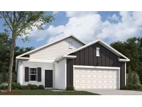 Charming single-story home featuring a two-car garage, white siding, and a well-maintained lawn at 135 N Keatts Winner Ct, Clayton, NC 27520