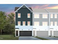 Charming townhome showcases a modern two-story design, complemented by a convenient attached garage at 1411 Chrysalis Pl, Apex, NC 27502