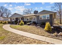 Charming home with a well-manicured lawn and inviting walkway leading to the front entrance at 1603 N Alston Ave, Durham, NC 27701