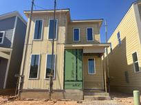 New construction of a two-story home showing windows and Zip System sheathing at 107 Parkland Dr, Pittsboro, NC 27312