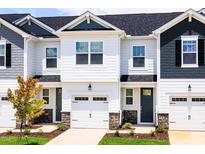 Charming townhome with attached garage and craftsman-style design at 18 Twin Birch Dr, Angier, NC 27501