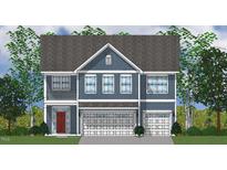Charming blue two-story home with a two-car garage and a small balcony is surrounded by lush trees at 247 Augusta Pond Way # 164, Raleigh, NC 27603