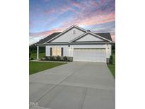Charming single-story home featuring white siding, a two-car garage, and a well-manicured lawn at 380 Pecan Valley Way, Four Oaks, NC 27524