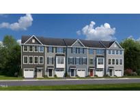 A row of new townhomes in varying colors with garages, manicured lawns, and beautiful blue sky at 603 Silverado Sunset Loop, Wendell, NC 27591