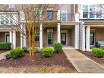 Charming townhome with well-manicured landscaping and inviting front entrance at 4963 Highcroft Dr, Cary, NC 27519