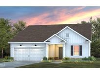 Charming one-story home with white siding, inviting entrance, attached garage and beautiful landscaped front yard at 780 Ben Ledi Ct, Raleigh, NC 27603