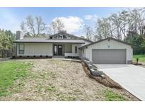 Charming single Gathering home with stylish design details and a well manicured lawn at 610 Flemingtown Rd, Henderson, NC 27537