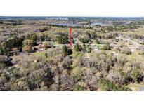 Overhead shot showing the property in relation to Lake Benson and downtown Raleigh at 408 Rand Rd, Raleigh, NC 27603