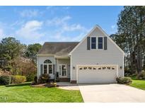 Charming one-story home with a well-manicured lawn and two-car garage in a suburban setting at 4108 4108 Gallatree Ln, Raleigh, NC 27616