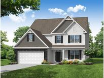 Charming two-story home featuring a stone-accented garage, complemented by black shutters and a well-manicured lawn at 1922 Cricket St, Elon, NC 27244