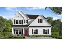 Charming two-story home featuring black shutters, a red front door, and classic architectural design at 262 Cardovia Way, Wendell, NC 27591