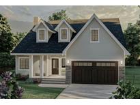 Charming two-story home with dormer windows and a two-car garage, complemented by a well-manicured front lawn and inviting curb appeal at Lot 15H Good Shepherd Trl, Spring Hope, NC 27882