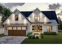 Charming two-story home showcasing a modern design, meticulous landscaping, and a welcoming entrance at Lot 21H Good Shepherd Trl, Spring Hope, NC 27882