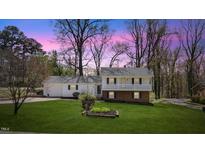 Charming two-story home with a landscaped front yard and inviting curb appeal at 1101 Driftwood Dr Dr, Siler City, NC 27344
