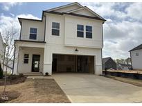 Stunning two-story home with a spacious two-car garage and inviting curb appeal at 4310 Emeline Way # 18, Fuquay Varina, NC 27526