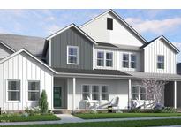 Charming two-story home with Hardie board siding, covered porch, and manicured front lawn at 3922 Willow Gate Way, Raleigh, NC 27604