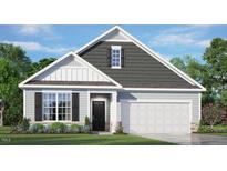 Charming single-Gathering home with light blue siding, black shutters, and a two-car garage, on a sunny day at 1914 Malvina Ct, Graham, NC 27253