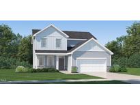 Charming two-story home featuring stone accents, a two-car garage, and a well-manicured lawn at 4012 Shadbush St, Raleigh, NC 27616