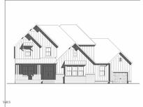 Charming elevation showcasing this two-story home with vertical siding, covered entry and double gable rooflines at 113 Stickleback Dr, Willow Springs, NC 27592