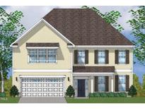Charming two-story home featuring a symmetrical facade, dormer, shutters, and an attached two-car garage at 20 Bold Dr, Youngsville, NC 27596