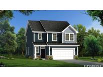 Two-story home with a modern color scheme, manicured lawn, and an attached two-car garage at 1007 Shovelhead Dr # 4, Durham, NC 27703