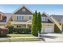 Charming two-story home with well-manicured lawn and attached two car garage at 304 Frontgate Dr, Cary, NC 27519