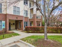 Charming condominium with brick accents and manicured landscaping at 800 Moratuck Dr # 108, Raleigh, NC 27604