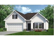 Charming new construction home featuring white siding, stone accents, a two-car garage, and tasteful landscaping at 21 Mildred Pl, Broadway, NC 27505