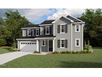 Charming two-story home with gray siding, black shutters, attached garage, and a well-manicured lawn at 1904 Harrell Cove Ct # 173 Eldorado Cl, Fuquay Varina, NC 27526