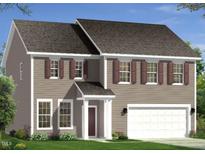 Charming two-story home with a two-car garage, covered entry and beautifully landscaped yard at 53 Brooklynn Trl # 183, Angier, NC 27501