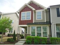 Charming two-story home with inviting curb appeal and colorful siding at 1725 Mallard Trace Dr, Wendell, NC 27591