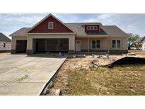 Charming new construction home with a three-car garage and red accent trim at 76 Royal Ave, Selma, NC 27576