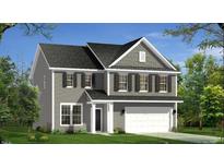 Charming two-story home with gray siding, black shutters, a well-manicured lawn, and an attached two-car garage at 420 Shelby Meadow Ln, Angier, NC 27501