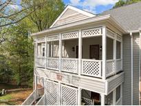 Charming condo with a private, lattice-adorned covered porch for outdoor enjoyment and relaxation at 102 Choptank Ct # B5, Cary, NC 27513