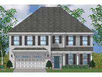 Charming two-story home featuring a combination of brick and siding, enhanced by black shutters and a well-manicured lawn at 75 Black Walnut Dr # 189, Garner, NC 27529
