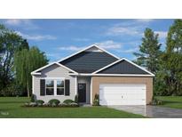 Charming single-story home with a brick and siding exterior and a two-car garage at 1014 Middlecrest Dr, Rocky Mount, NC 27804