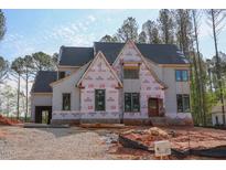 Exterior view of home in construction phase showcasing its architectural design at 7436 Summer Tanager Trl, Raleigh, NC 27614