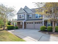Charming two-story home with a two-car garage and well-maintained landscaping at 112 Red Admiral Ct, Hillsborough, NC 27278