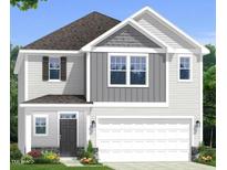 Charming two-story home featuring a two-car garage and beautifully landscaped front yard at 160 Steel Springs Ln # 45, Angier, NC 27501
