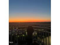 Enjoy breathtaking sunset views from the condo balcony of this urban condo at 400 W North St # 1420, Raleigh, NC 27603