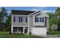 Charming two-story home featuring gray siding, black shutters, and a well-manicured front lawn at 1105 Ursa Major Ct, Wendell, NC 27591
