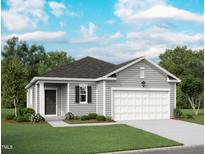 Charming single-story home with a two-car garage, landscaped front yard, and light gray siding at 133 Gladstone Loop, Clayton, NC 27520