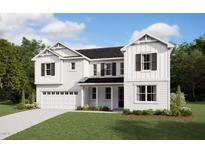 Charming two-story home with a well-manicured lawn, attached garage, and classic architectural details at 159 Yellow River Way, Garner, NC 27529
