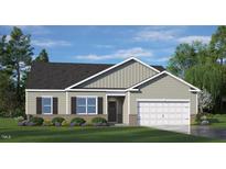 Charming single-story home featuring a two-car garage, a well-manicured lawn, and an inviting facade at 1208 Pavo Path, Wendell, NC 27591
