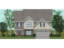 Charming two-story home with stone accents, gabled roof, and attached garage at 108 Berry Mill Ln # 132, Raleigh, NC 27603