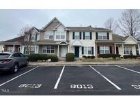 Inviting townhome with well-maintained landscaping and convenient parking at 8013 River Water Ct, Raleigh, NC 27616
